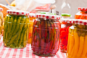 jars of colorful pickled beets, green beans, and carrots